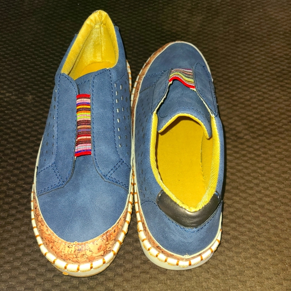 Shoes. Not sure of the brand size 8 comfy shoe worn once. Unique style